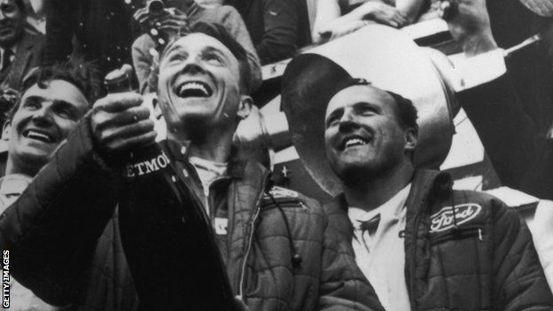 Gurney and Foyt celebrate their 1967 Le Mans 24 Hours win