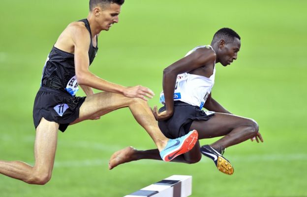 Conseslus Kipruto (R) of Kenya is on his way to win the men"s 3,000m Steeplechase race during the Weltklasse IAAF Diamond League international athletics meeting in Zurich