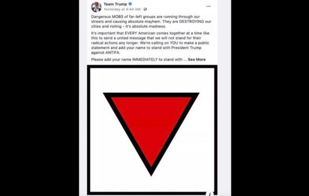 A screenshot showing the symbol used in a Trump campaign ad and removed from Facebook