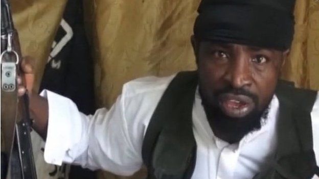 Снимок экрана, сделанный 24 марта 2014 года из видео, полученного AFP, на котором запечатлен лидер «Боко Харам» Абубакар Шекау