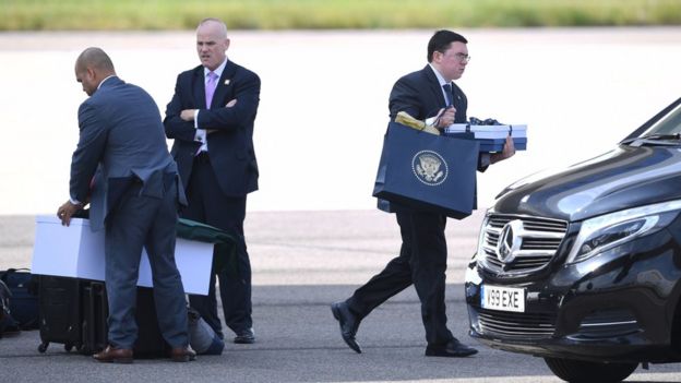 Items are unloaded from Air Force One following the arrival of US President Donald Trump and his wife Melania at Stansted Airport in Essex,