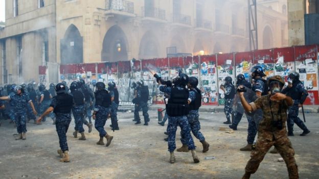 Riot police fired weapons during anti-government protests in Beirut