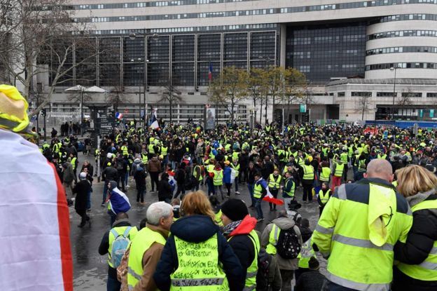 People wearing yellow vest gather in Bercy, in front of the French Ministry for the Economy and Finance, in Paris, on 12 January 2019