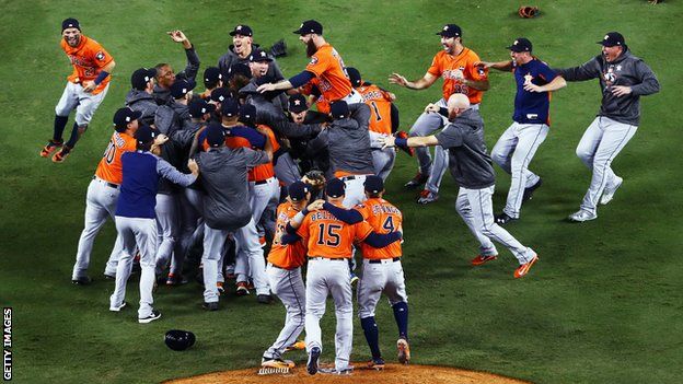 The Houston Astros celebrate after winning the 2017 World Series