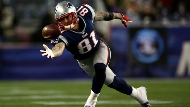 Aaron Hernandez plays for the New England Patriots against the Baltimore Ravens during the 2013 AFC Championship.