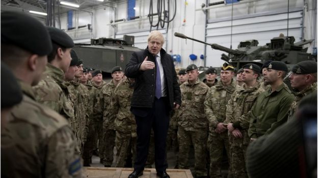 Boris Johnson spoke to British troops stationed in Estonia during a one-day visit to the Baltic country on 21 December.