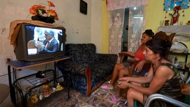 Woman watch on TV in Havana Cuba"s new President Miguel Diaz-Canel takes over from Raul Castro after he was formally named his successor by the National Assembly on April 19, 2018.