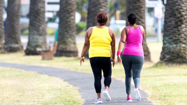 Two women walking in South Africa