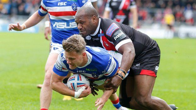 Wakefield's Jacob Miller (left) and Salford's Rob Lui both got on the scoresheet at the AJ Bell Stadium