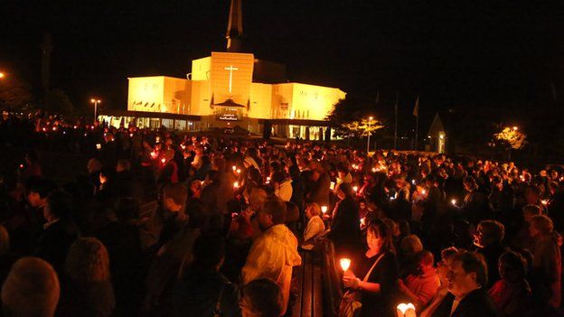 A candlelight procession outside Knock basilica during its annual Novena