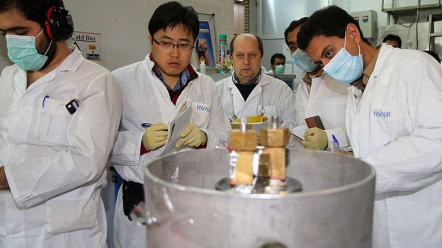 IAEA inspectors and Iranian technicians at nuclear power plant in Natanz (file photo)