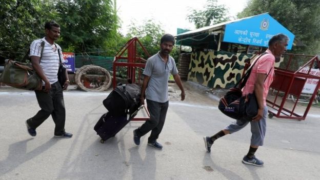 Tourists leave from Amarnath base camp after the pilgrimage was suspended