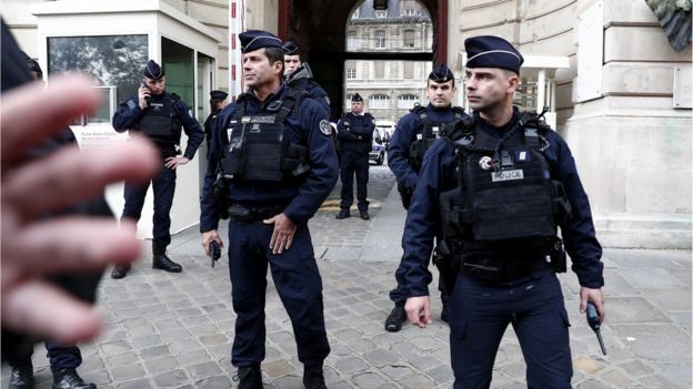 French police and security forces establish a security perimeter near Paris police headquarters after attack on 3rd October