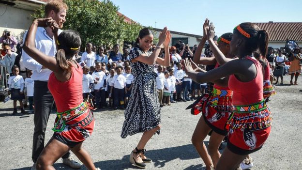 Prince Harry and Meghan join dancers