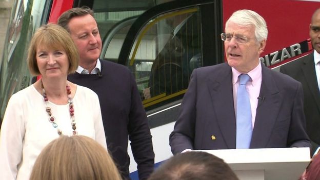 David Cameron and Harriet Harman listen to Sir John Major speaking