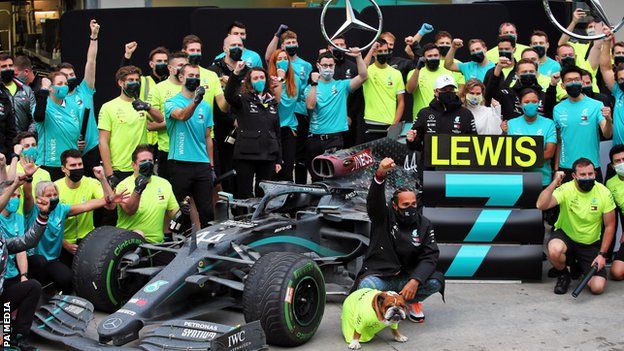 Lewis Hamilton celebrates winning his seventh world title