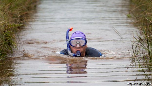 A competitor takes part in the World Bog Snorkelling Championships