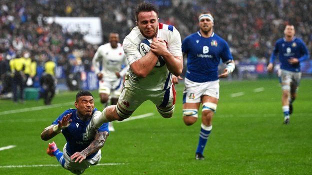 France's Anthony Jelonch dives over to score a try in the 2022 Six Nations match with Italy