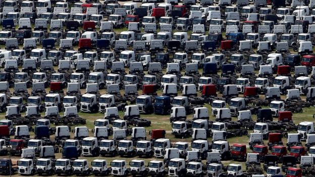 New Ford trucks are seen at a parking lot of the Ford factory in Sao Bernardo do Campo, Brazil, February 12, 2015.