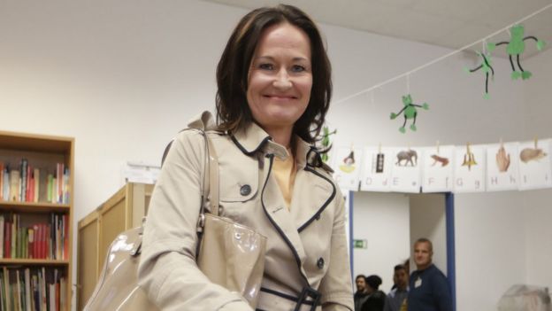 The head of the Austrian Green party, Eva Glawischnig, casts her ballot at a polling station in Vienna, Austria on 29 September, 2013.