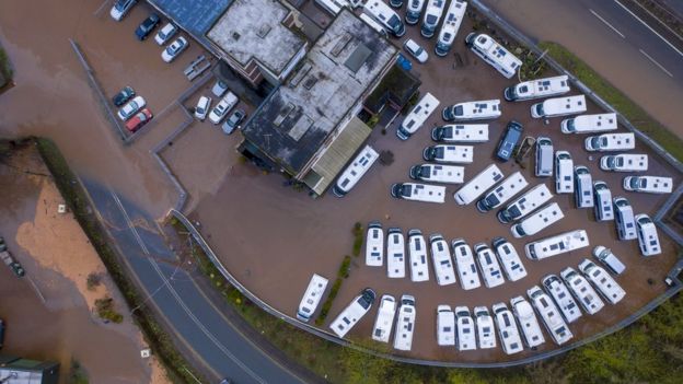 A flooded motorhome dealership is seen following Storm Dennis on February 18, 2020 at Symonds Yat, Herefordshire, England.