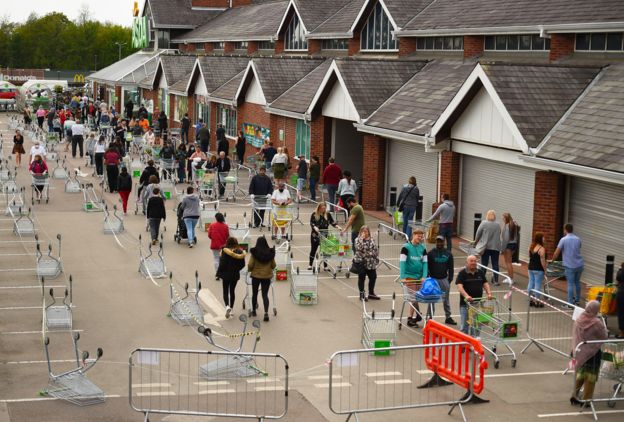 Queuing outside an Asda store in West Yorkshire