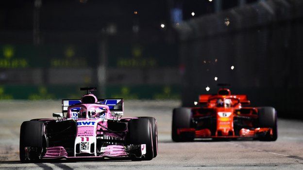 Force India's Sergio Perez leads Ferrari's Sebastian Vettel
