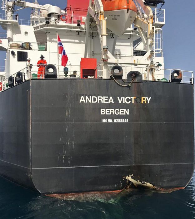 A picture taken of Norwegian oil tanker Andrea Victory with damage to its side