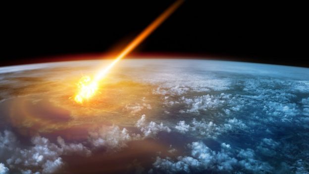 Asteroide impactando en la Tierra