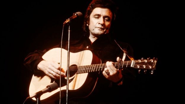 Johnny Cash performing in 1976
