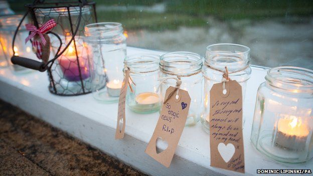 Candles laid in tribute on the Adur Ferry Bridge in Shoreham