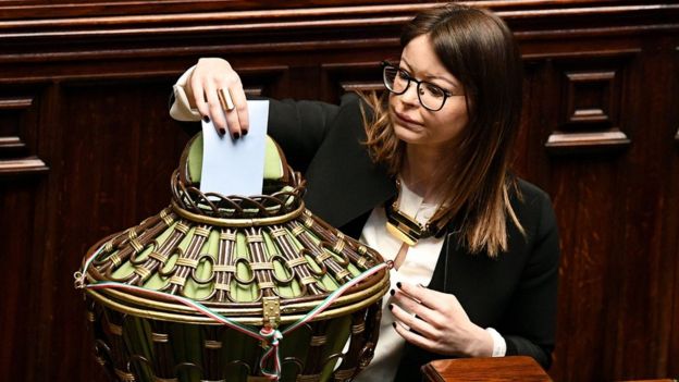 Italian lawyer and Democratic Party (PD) member Lucia Annibali casts her vote in the Chamber of Deputies in Rome on March 23, 2018