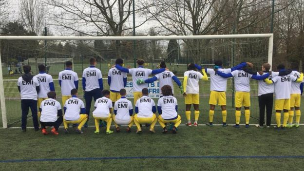 The under-19s at FC Nantes pose for pictures - wearing t-shirts with the words 