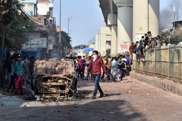 Protesters seen during clashes between a group of anti-CAA protestors and supporters of the new citizenship act, near Maujpur and Jaffrabad metro station on February 24, 2020 in New Delhi, India.