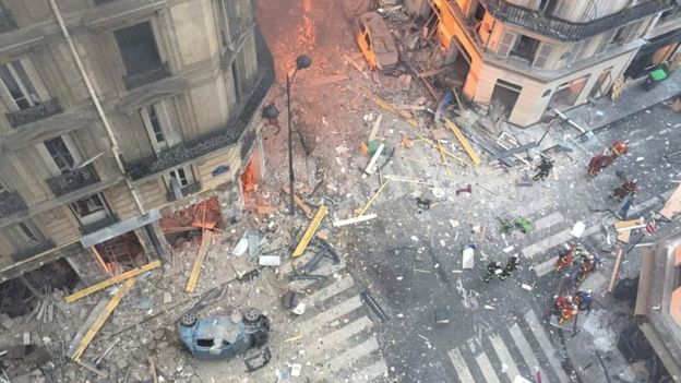 A general view shows debris and car wreckage following the explosion of a bakery on the corner of the streets Saint-Cecile and Rue de Trevise in central Paris on January 12, 2019.