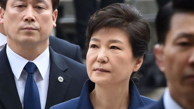 South Korea's ousted president Park Geun-Hye (C) arrives for a hearing to decide whether she should be arrested over the corruption and abuse of power scandal that brought her down, at a court in Seoul on 30 March 2017.