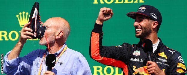 Actor Patrick Stewart does a 'shoey' with Daniel Ricciardo