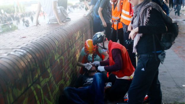 Medics help an injured person