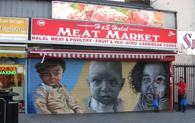 Babies painted on shop shutter