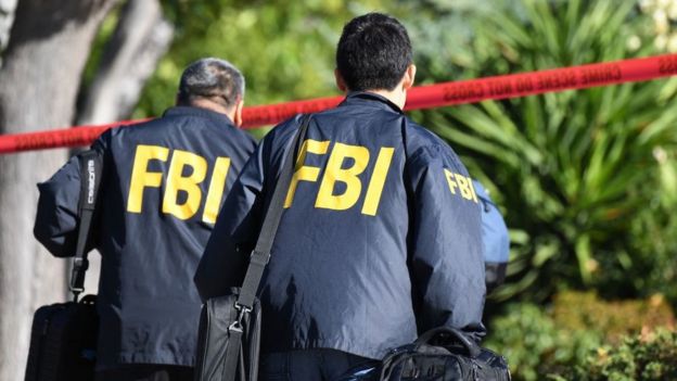 FBI investigators arrive at the home of suspected nightclub shooter Ian David Long on November 8 2018, in Thousand Oaks, California