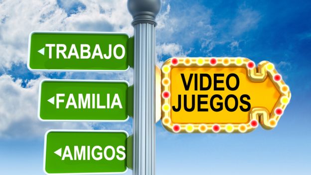 Poste indicando hacia un lado 'videojuegos' y hacia el otro, 'trabajo, familia, amigos'.