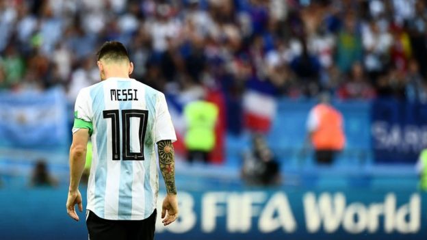 Argentina"s forward Lionel Messi walks on the pitch during the Russia 2018 World Cup round of 16 football match between France and Argentina at the Kazan Arena in Kazan on June 30, 2018.