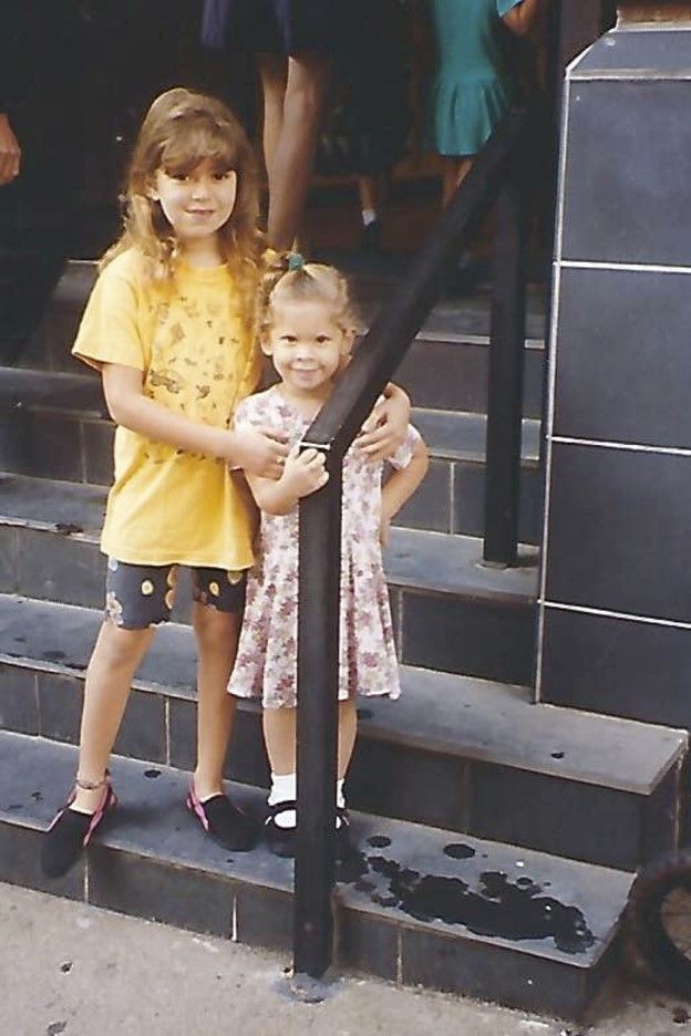 Anna with her older sister in 1995