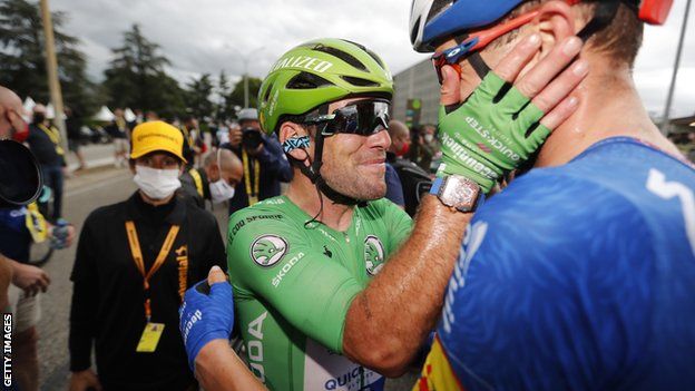 Mark Cavendish (left) celebrates with a Deceuninck-Quick-Step team-mate after winning stage 10 of the 2021 Tour de France
