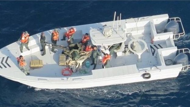 Pentagon-supplied picture purporting to show an Iranian Revolutionary Guards Corps Navy vessel whose crew removed an unexploded limpet mine from a Japanese tanker, 17 June 2019