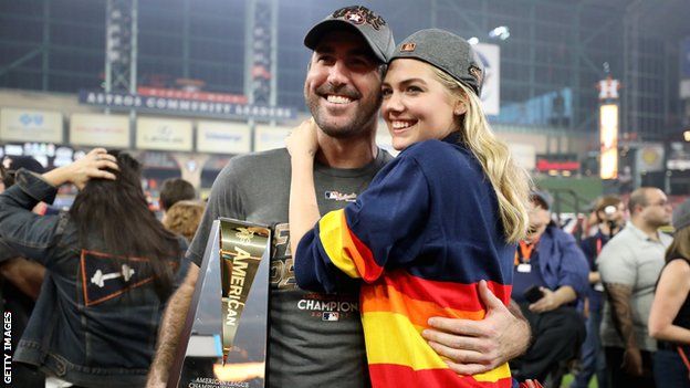 Houston Astros pitcher Justin Verlander with fiancee Kate Upton and the MVP trophy