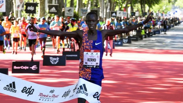 Kenya's Reuben Kerio celebrates while crossing the finish line to win the 42nd Madrid Marathon in Madrid, Spain, 27 April 2019