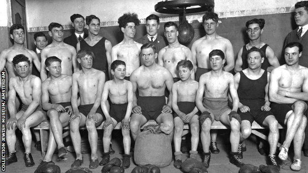 A group of young boxers in 1924 Amsterdam pose for a photo