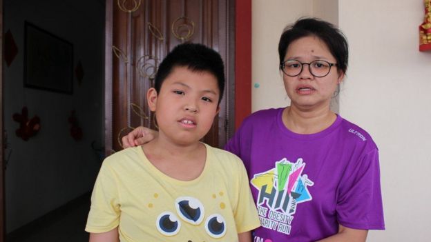 Belle Tan y su hijo de once años