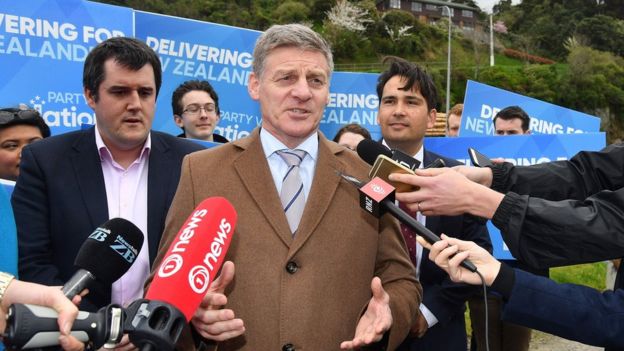 Bill English speaking to reporters